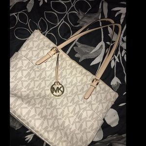 MK creme colored bag
